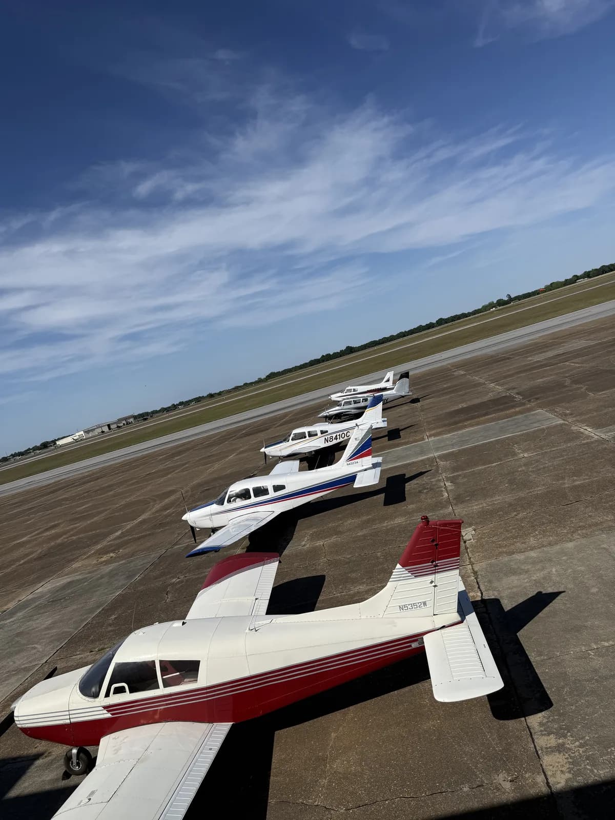 ACOM Aviation fleet lined up on the ramp at Ozark-Blackwell Airport (71J)