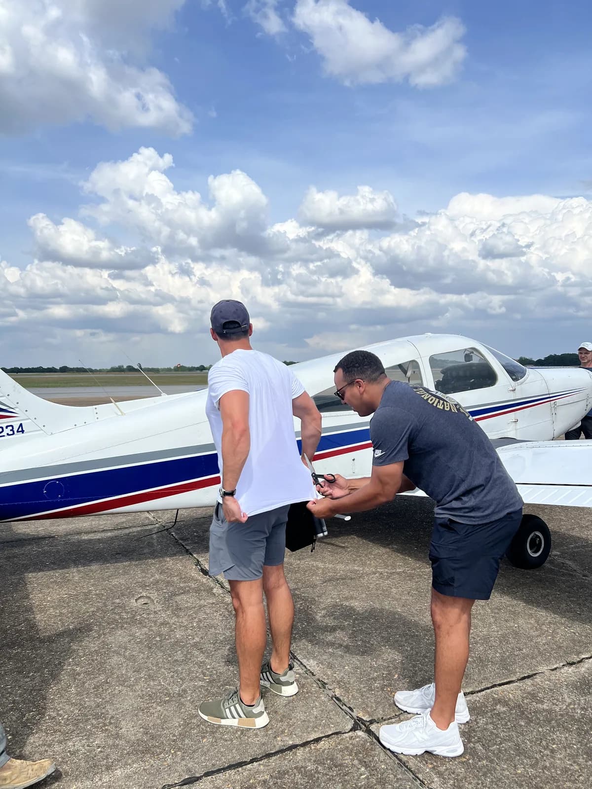 Preflight inspection of a Piper Cherokee with a student at Ozark-Blackwell Airport (71J)